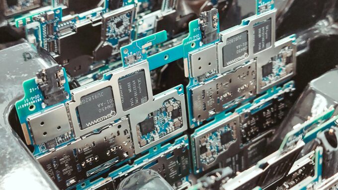 Close-up of intricate circuit boards in a Vietnamese factory, capturing modern electronics production.